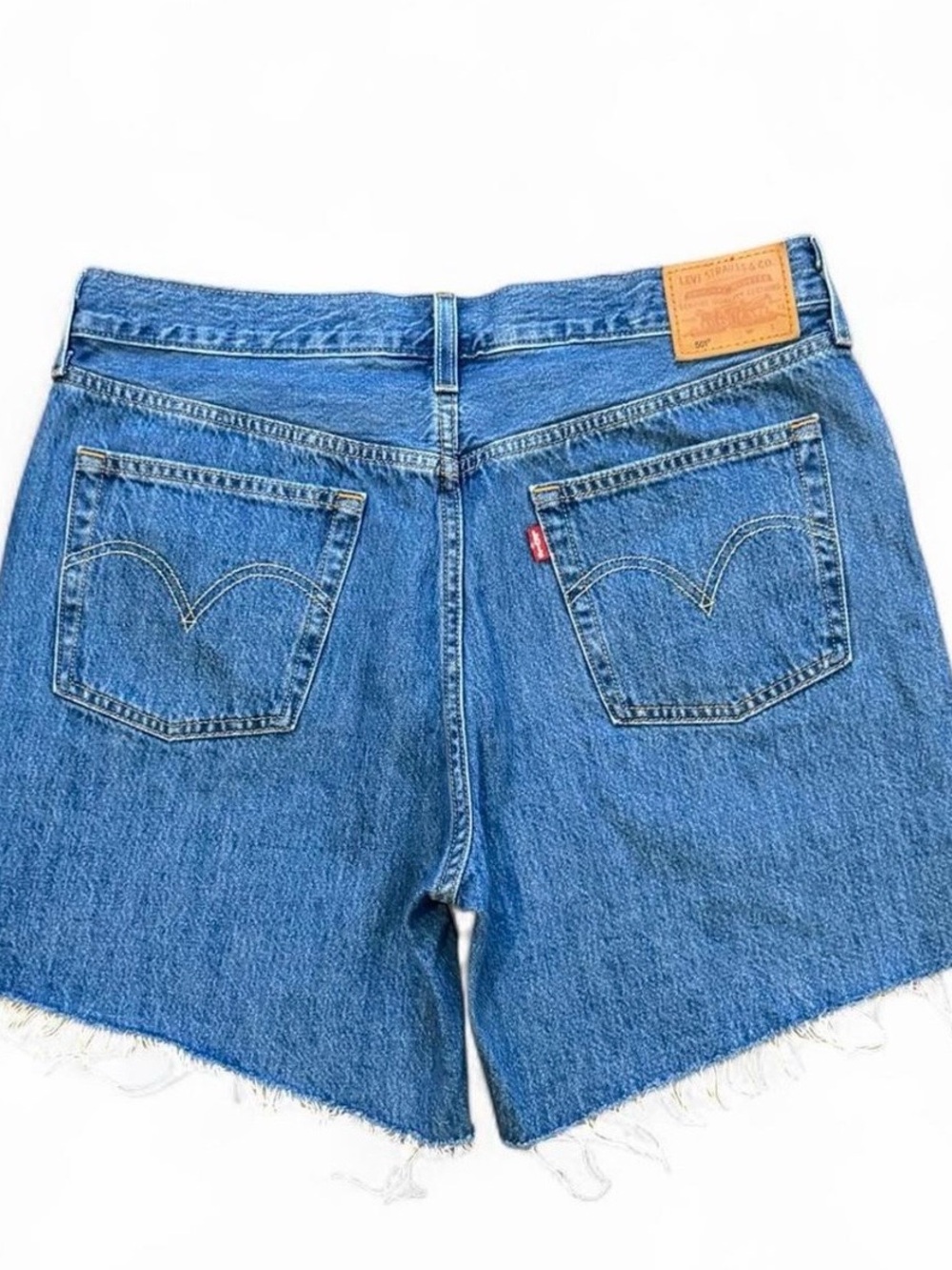 Levi's 501 blue raw hem mid thigh denim shorts